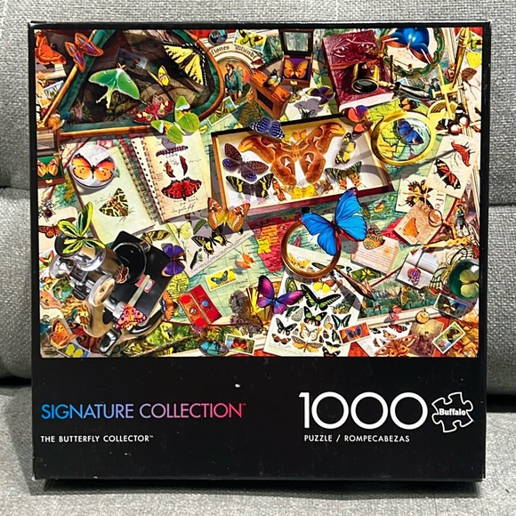 🔴2/$20🔴Buffalo Games The Butterfly Collector 1000 piece jigsaw puzzle - Picture 1 of 3